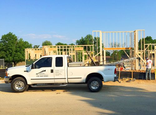 Construction site with wood framing being done.