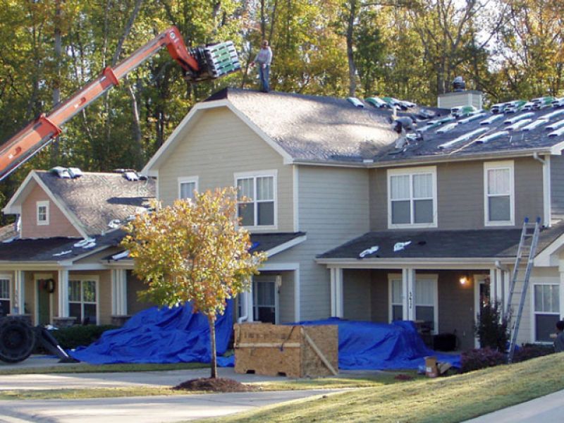 A town home can have asphalt shingles with multiple sections.